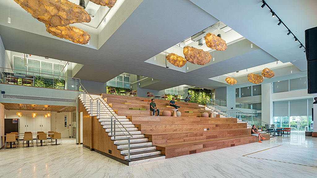 A large room with a large staircase.